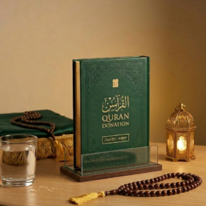 Quran Donation in Mecca. Copies of the Holy Quran being distributed to pilgrims inside Masjid al-Haram in Makkah as Sadaqah Jariya on behalf of a donor or deceased loved one